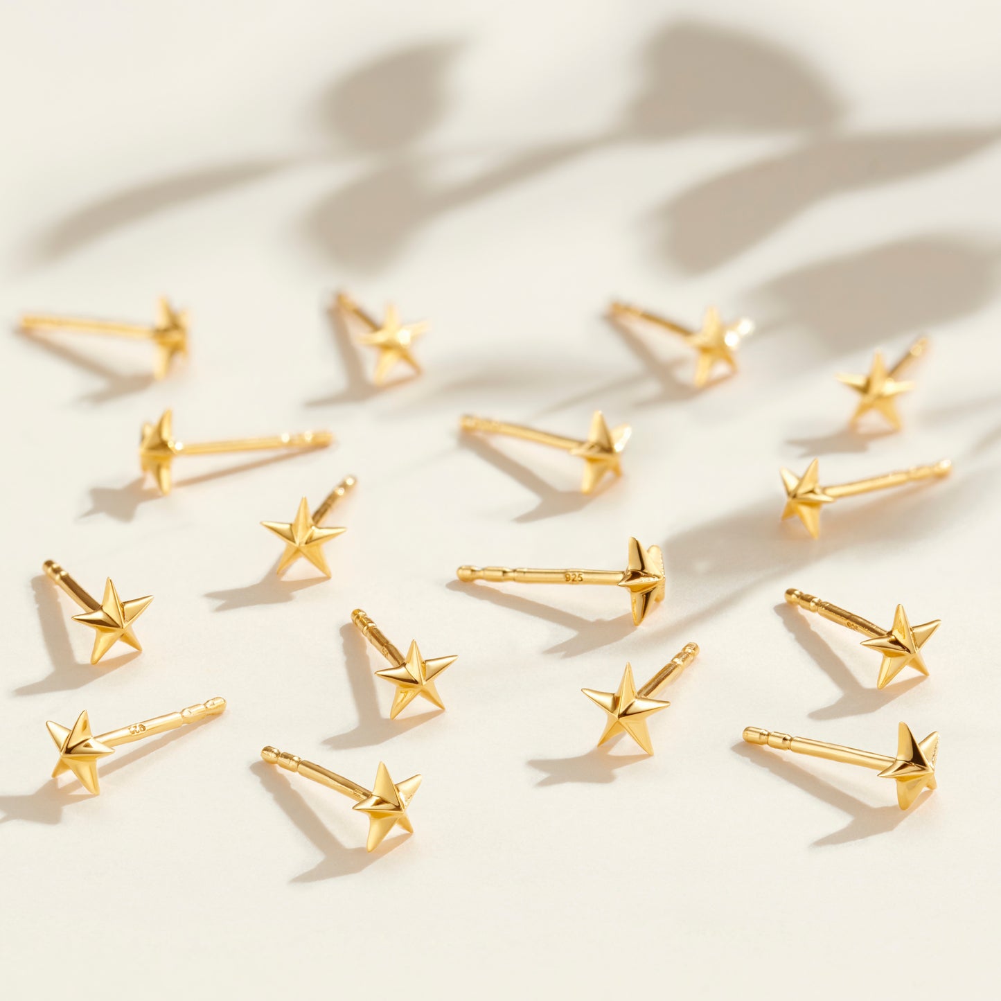 multiple tiny 3d gold vermeil star stud earrings