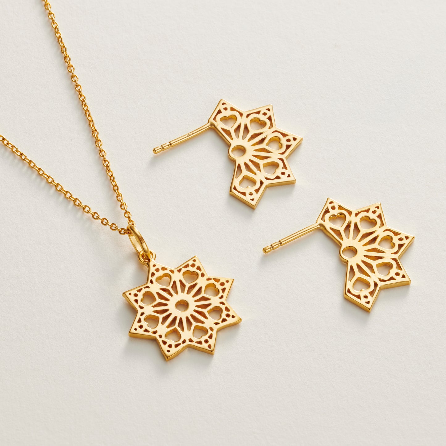Heart flat fan style hoop earrings & necklace in gold vermeil flatlay