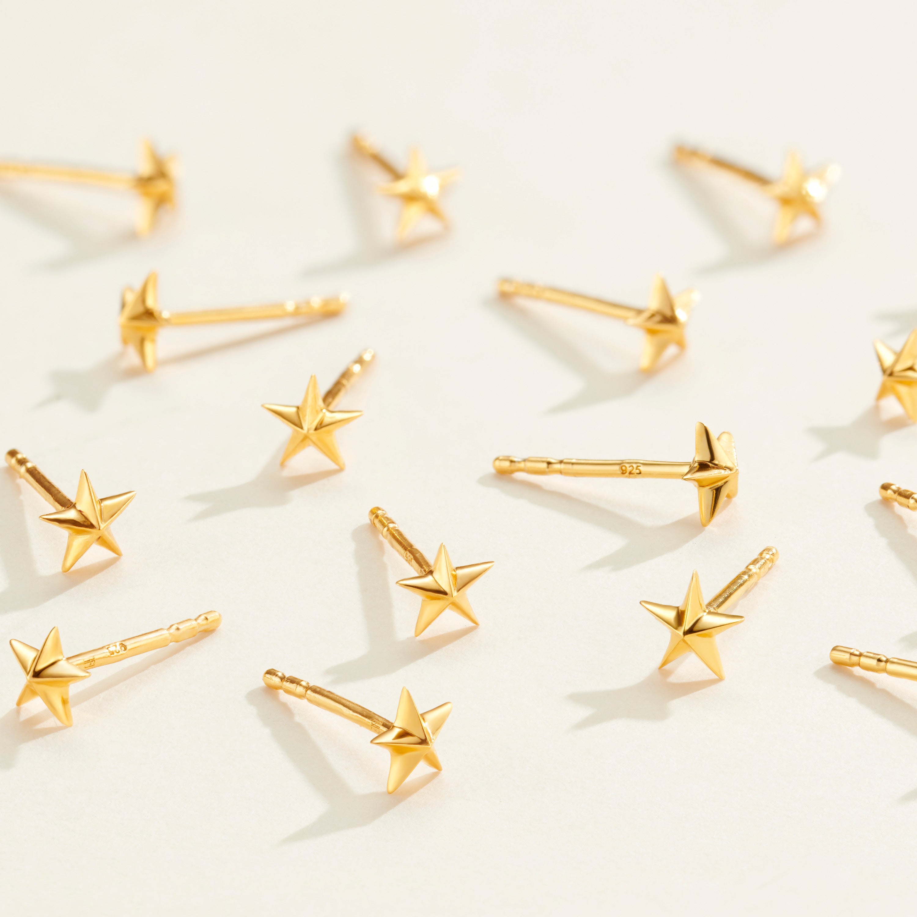 multiple tiny 3d gold vermeil star stud earrings